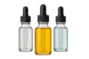 Three cosmetic dropper bottles with clear, yellow, and blue liquid essence for beauty skincare on transparent background