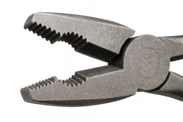 Metal pliers showing serrated jaws, a heavy duty hand tool for gripping, holding, and bending materials on transparent background