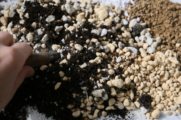 making a handamde soil mix special for a cactus arrangement pot
