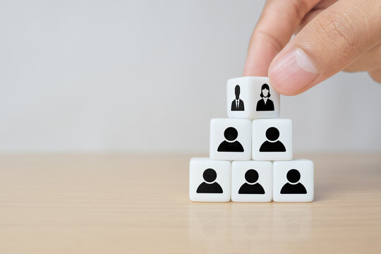 business hand man put arranging on dice that family or company Succession business concept from old generation to next generation. - Powered by Adobe