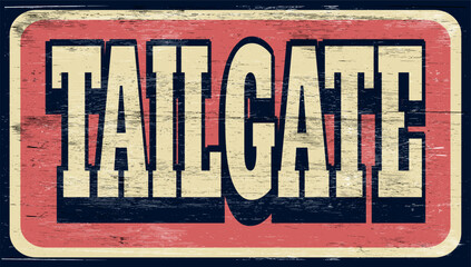 Aged and worn vintage tailgate sign on wood