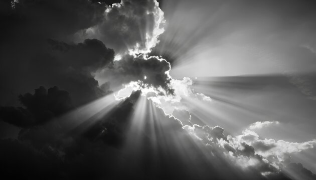 black and white of abstract cloudscape with sunbeams and light rays