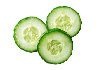 Three cucumber slices, cross-section, on dark background