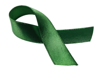 Emerald satin ribbon looped on a dark background