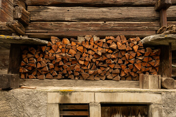 Split Fire Wood Stored Under Traditional Swiss Home