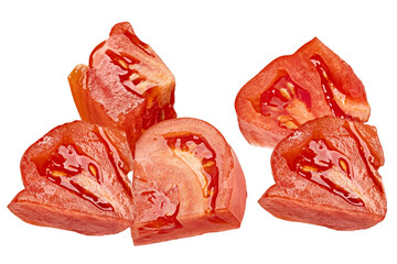close up photograph of juicy, vibrant red tomato chunks scattered against a solid transparent background, showcasing wet texture and seeds.