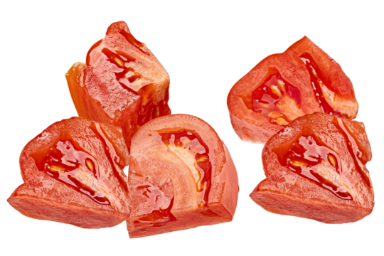 close up photograph of juicy, vibrant red tomato chunks scattered against a solid transparent background, showcasing wet texture and seeds.