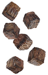 appetizing photograph of several diced, well-done roasted beef cubes or steak pieces isolated against a plain transparent background.