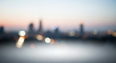 A blurred cityscape at sunset with silhouettes of buildings and lights.
