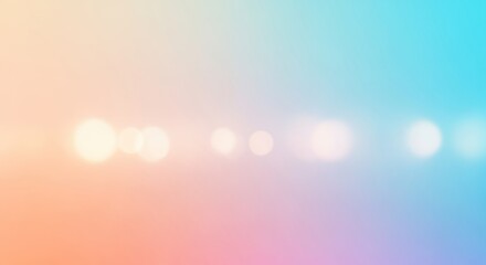 A blurred image of a colorful abstract background with a gradient of pastel colors.