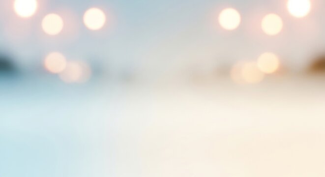 A snowy landscape with a blurred background of lights.