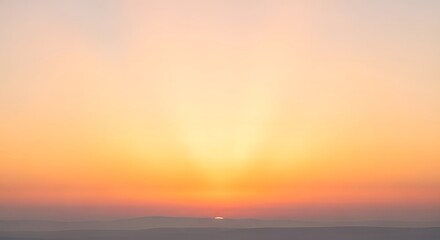 Obraz premium Hopeful Sunrise Rays with Soft Pastel Sky