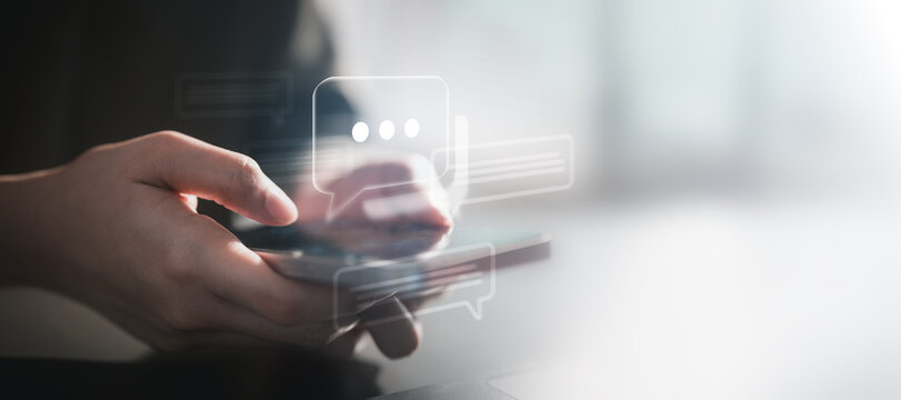 message, chat, messaging, texting, online, app, notification, Person typing on smartphone with floating chat bubbles, representing online messaging, communication, and social interaction.