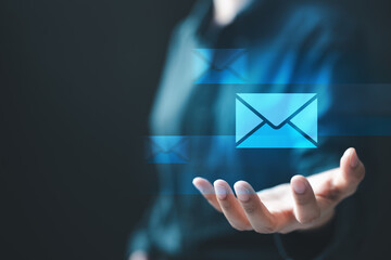 email, marketing, newsletter, inbox, message, spam, notification, A hand presenting floating email icons, symbolizing digital communication, email marketing, messaging, and online notifications.
