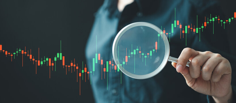 A person examining a candlestick chart with a magnifying glass, symbolizing stock analysis, market trends, trading strategy, and financial risk evaluation in the investment world.