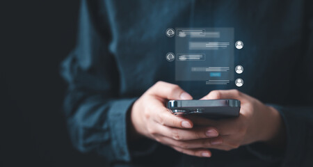 A person using a smartphone with floating AI chat interfaces, representing artificial intelligence,...