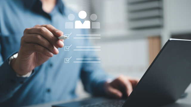 HR manager evaluating candidate profiles using a digital checklist, representing recruitment, hiring process, talent assessment, and employee selection in a modern workplace.