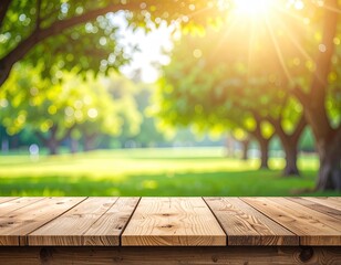 Wooden tabletop with sunlit park scene backdrop