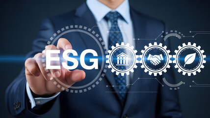 Businessman interacts with glowing ESG icons representing sustainability and corporate responsibility