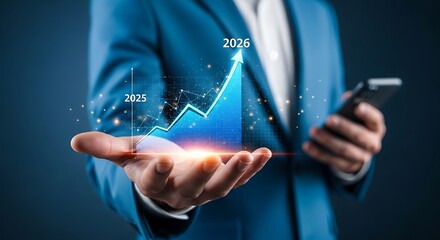 Businessman holding a glowing blue financial graph showing upward growth and success