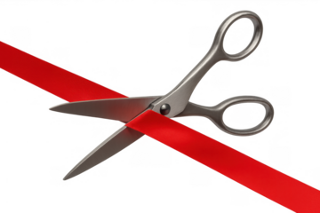 Stainless steel scissors cutting red ribbon, symbolizing grand opening, inauguration, ceremony, new business launch, beginning