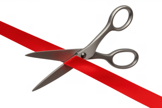 Stainless steel scissors cutting red ribbon, symbolizing grand opening, inauguration, ceremony, new business launch, beginning