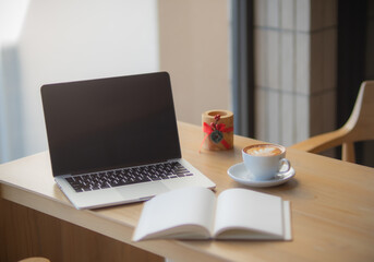 laptop and cup of coffee