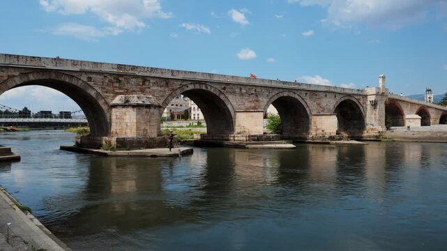 View of Stone bridge across Vardar River in Skopje, North Macedonia