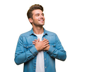 Smiling grateful man with hands on chest looking upward png image stock photo, isolated on transparent background