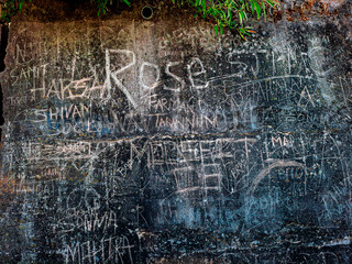 names wriiten on public wall, 
A photo took from the tourist hills of Mussoorie and Landour, 15.11.2025 at Mussoorie Uttarakhand India