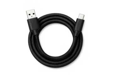 Black braided usb cable with type-a to type-c connectors, coiled for charging and data transfer, transparent background