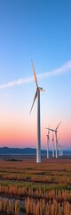 Wind turbines in a vast open field at sunset, capturing kinetic energy,  nature,  sustainable