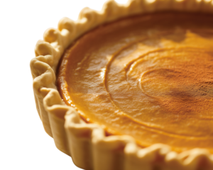 Delicious pumpkin pie a traditional dessert perfect for Thanksgiving or autumn celebrations isolated on white