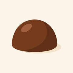 Single chocolate truffle on cream background