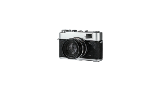 Sleek, silver & black camera against a stark, dark backdrop