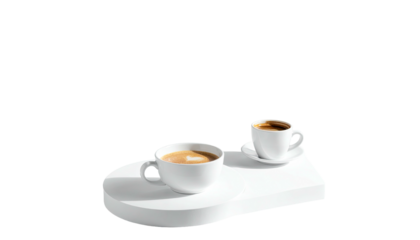 Two white coffee cups sit on a white platform, isolated
