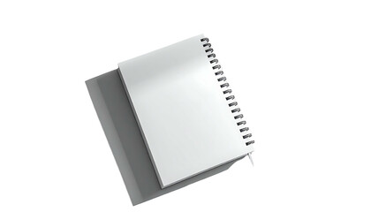 Plain blank spiral notebook isolated against a dark background