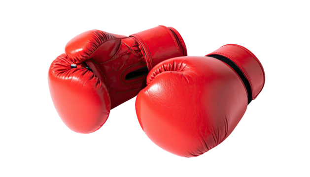Two red boxing gloves, leather look, isolated on black