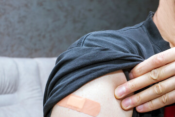 shoulder with patch after vaccination