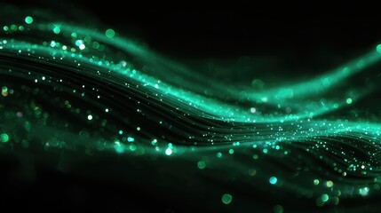 Green glitter particles flowing on a dark background