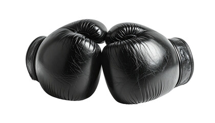 Two black boxing gloves facing each other against black backdrop