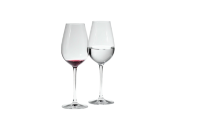 Two wine glasses, one red, one white, against black background