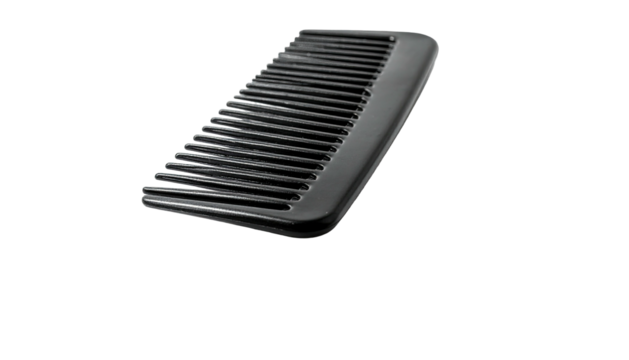 Angled black comb with curved teeth, against dark background