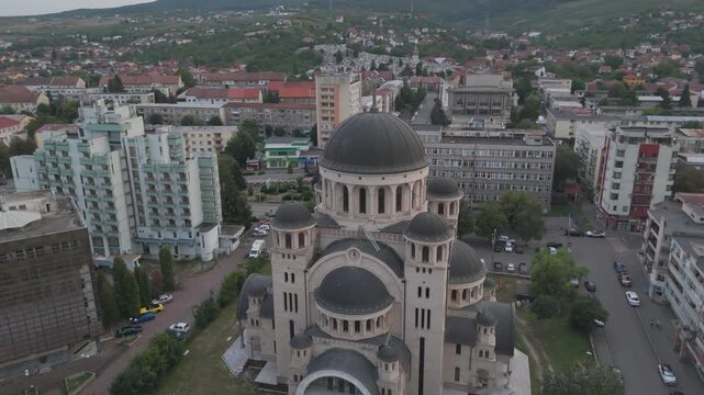 Scenic drone view of Catedrala Adormirea Maicii Domnului with surrounding urban landscape.