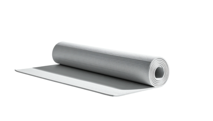 Rolled gray yoga mat partially unrolled on a black background