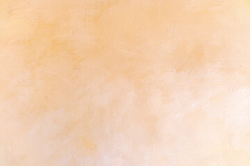 Soft warm cream color abstract background with subtle texture and gentle gradient light