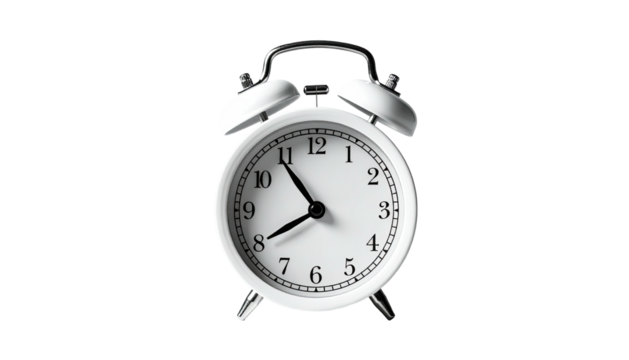 White alarm clock with twin bells against a black background