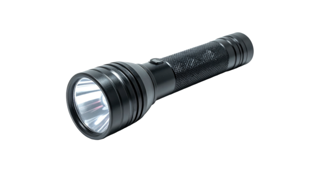Black flashlight angled, emitting bright light