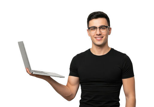 Smiling young man wearing glasses and a black t shirt holding a laptop computer isolated on transparent background