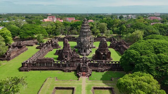 Aerial drone view of Phimai Historical Park in Nakhon Ratchasima, Thailand with a lush green grounds, revealing the majestic beauty and heritage of this historic site
